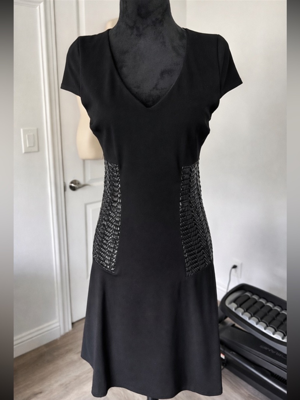 Bebe v-neck dress with woven faux leather sides